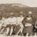 Photo, Six women sit in line at beach; 1943; RAP2020.0007