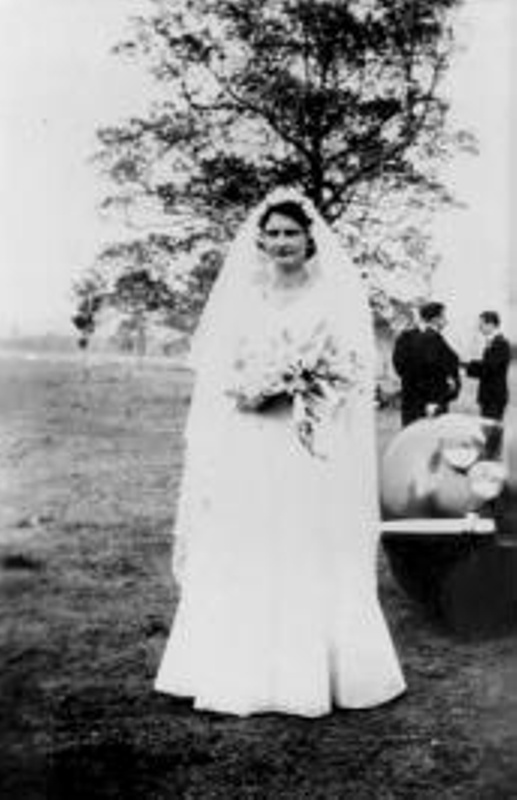 Photo Fay Miller (nee Peachey) in wedding dress at 'Sunny Brae'.; 17