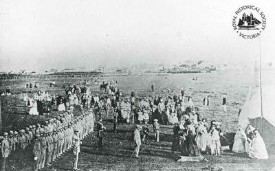 Belfast Volunteer Rifle Company and spectators at parade, showing the presentation of a silver bugle by Mrs William Rutledge, 1860. ; GS-EV-37 Belfast Volunteer Rifle Company and spectators at parade, showing the presentation of a silver bugle by Mrs William Rutledge, 1860. ; GS-EV-37