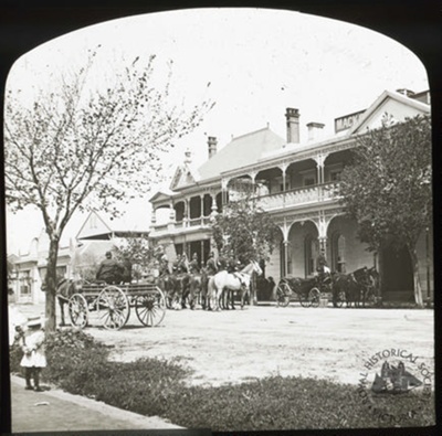 Mack's Hotel, Geelong, showing mounted police outside and coach and pair (possibly associated with Royal visit), c. 1890 ; GS-EV-27