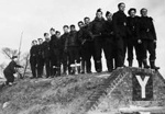 photo negative - ground crew standing on top of 'Y' shelter; IWM; 19 January 1943; 2018.1.389 
