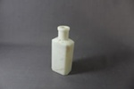 Milk glass bottle; 233 