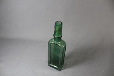 Dr Sheldon's magnetic liniment bottle; 239 