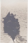 Small boat full of people heading off; ULMPH 2000 0595 