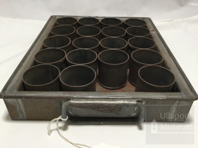 Tin tray with cylindrical cups; ULM 1997 016  