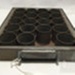 Tin tray with cylindrical cups; ULM 1997 016  