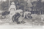 People excavating pre-Historic cairn at inverlael; ULMPH 2000 0585 