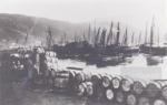 Many barrels for herring and many boats at Ullapool pier; ULMPH 2000 0599 