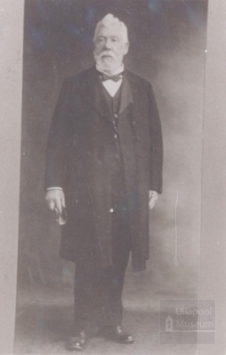 Older man with white hair and beard - bow Tie and long Jacket; ULMPH 2000 0600 