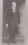 Older man with white hair and beard - bow Tie and long Jacket; ULMPH 2000 0600 