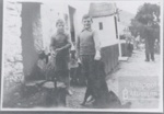Two young boys and dog outside house at crofton - man in Yacht Jumper in background; ULMPH 2000 0603 