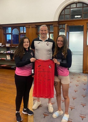 Daniela Florez, Neil Sinclair (Head Coach) and Tyler Rattray with the McDermid Ladies jersey; 2022; GWL-2022-52