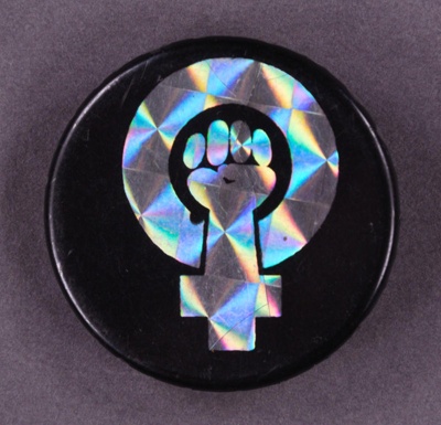 Badge: Feminist power symbol; GWL-2013-19-6