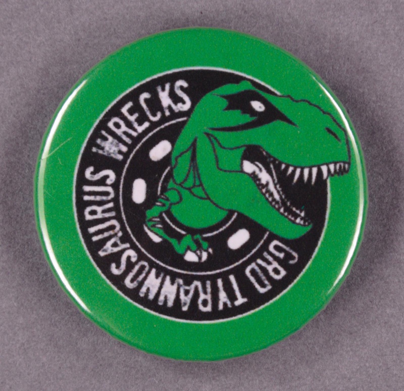 Badge: Tyrannosaurus Wrecks; Glasgow Roller Derby; 2013; GWL-2013-32-4