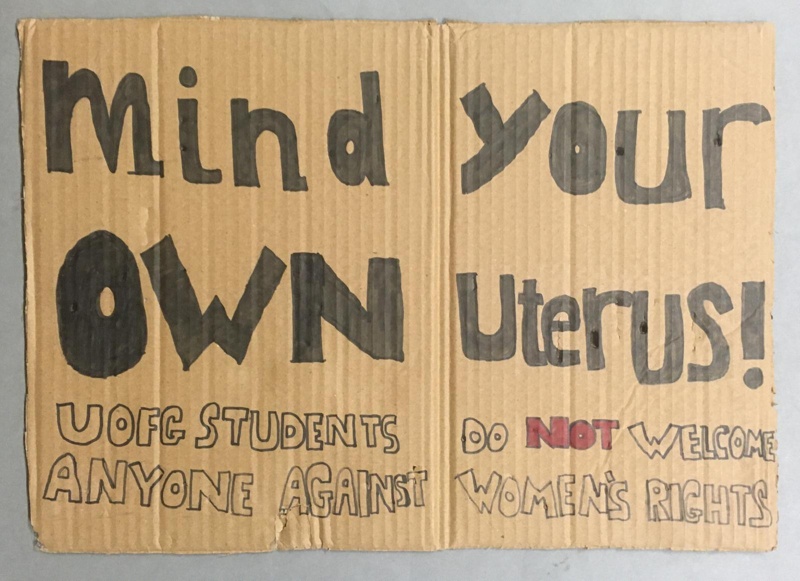 Placard: Mind Your Own Uterus; Glasgow Students for Choice; 2023; GWL-2023-55-20