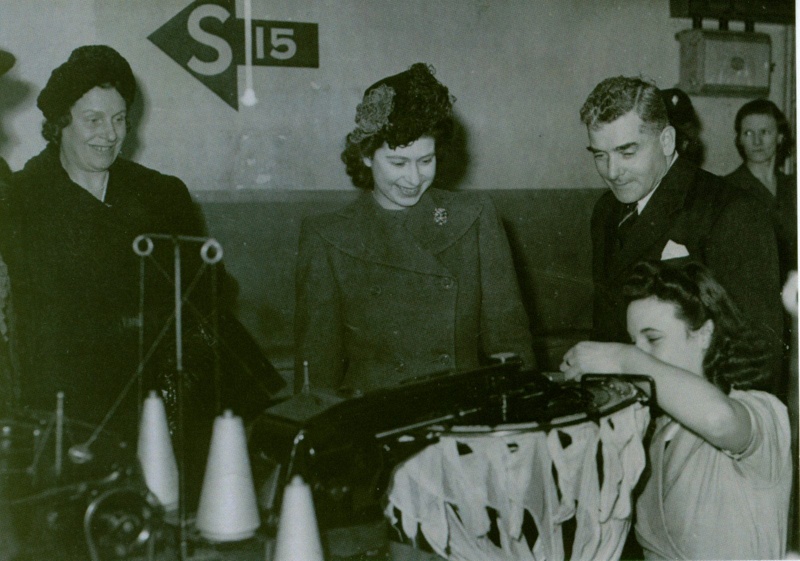 IET Archives postcard featuring black and white image of a royal visit to a stocking factory, 1946