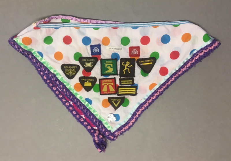 Poncho with Brownie Guide Badges; 1980s; GWL-2018-69-1