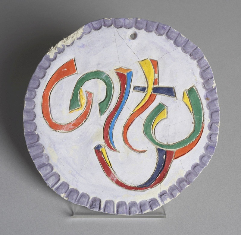 Round clay 'Unity' plaque made by Gheni Yorke (2002)