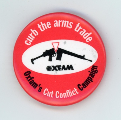 GWL-2015-112-46: Badge: Curb the Arms Trade; Oxfam GB; c.1980s