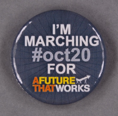 Badge: I'm Marching #Oct20 ~ A Future That Works; c.2012; GWL-2014-43-6