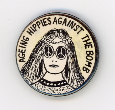 GWL-2015-112-14: Badge: Ageing Hippies Against the Bomb; c.1980s GWL-2015-112-14: Badge: Ageing Hippies Against the Bomb; c.1980s