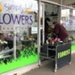 Florist open during lockdown, selling from rope barrier at entrance; Choat, Liz; 2021 Aug. 26; PD3194