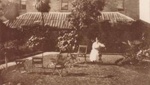 Louise Schmidt in garden behind Hampton Hotel; c. 1914; P0311