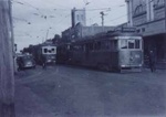 Electric tramcar nos. 50, 51 and another, in Bay Road, Sandringham; 1955 Oct.; P1050