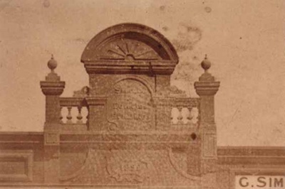 Parapet of Small and Edwards Buildings above Spilcker's Store.; c. 1902; P0100