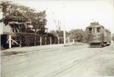 Tram 49 passing 19 Ebden Avenue, Black Rock; 192-; P6337