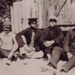 Group of "sailors" outside a boatshed at Half Moon Bay; 190-; P1516
