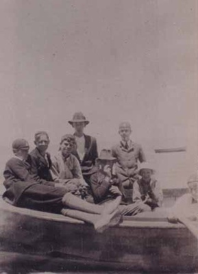 Family group in boat, Beaumaris; 1921; P0504