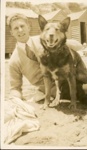 Keith Hutchinson on Hampton beach with German Shepherd dog; Venn family; 1950; P12329