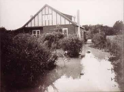 House with flood at rear.; 196-; P1470