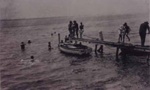 Boating around the boat sheds at Tom Woods pier, near Table Rock.; 1921; P0486