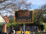 COVID-19 vaccination clinic signage, Sandringham Hospital; Choat, Liz; 2021 Aug. 18; PD3231