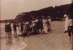 Oliver Pearce pulling in the fishing nets at Half Moon Bay.; c. 1915; P1991