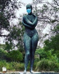 Guy Boyd's sculpture of The Swimmer wearing a face mask; Bell, Nicole; 2021 Jul. 18; PD3242
