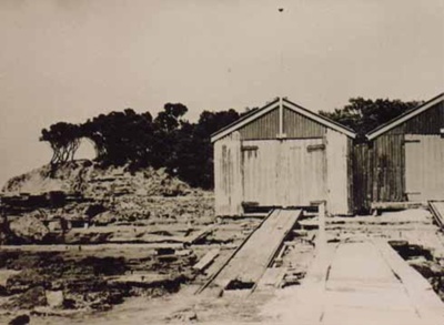 Boatsheds at Table Rock Point.; c. 1938; P0814