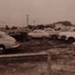 Cars parked at the Dunlop battery manufacturing plant, Sandringham.; Cockburn, David M.; 1956; P0589