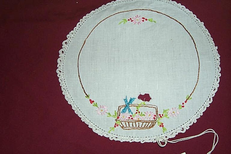 Doily, (1), white background, embroidered basket of flowers, crochet
